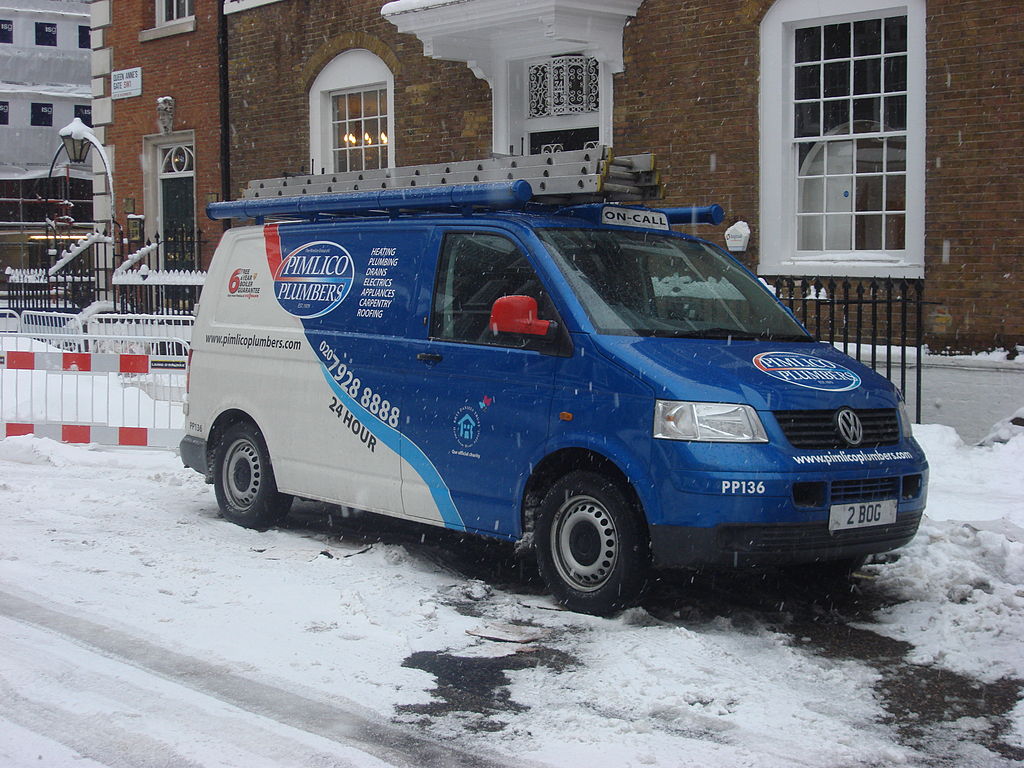 Fleet owner comparing GPS tracker options for company vehicles
