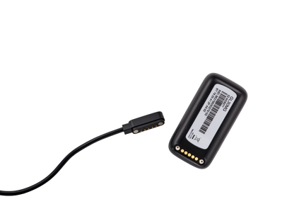 Atlas Mini with its magnetic charging cable detached