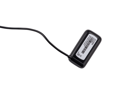 Atlas Mini charging on its magnetic cable